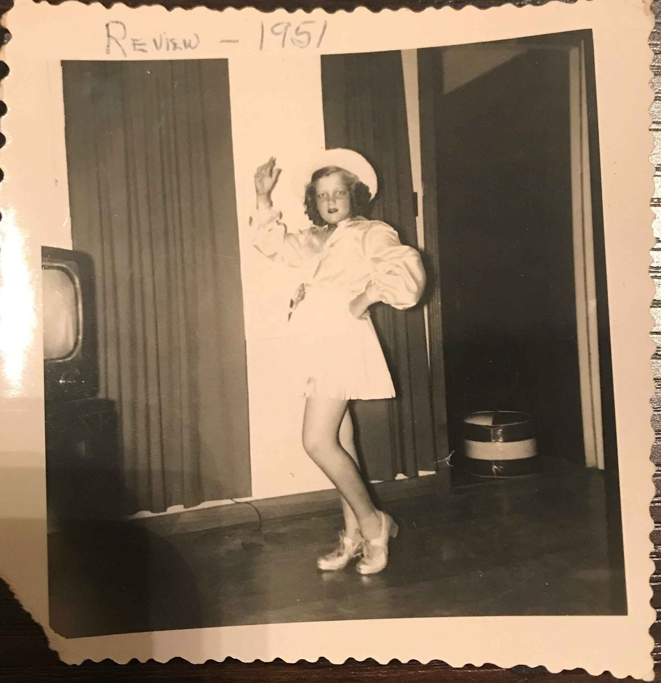 Girl tap dances at dance revue circa 1940s